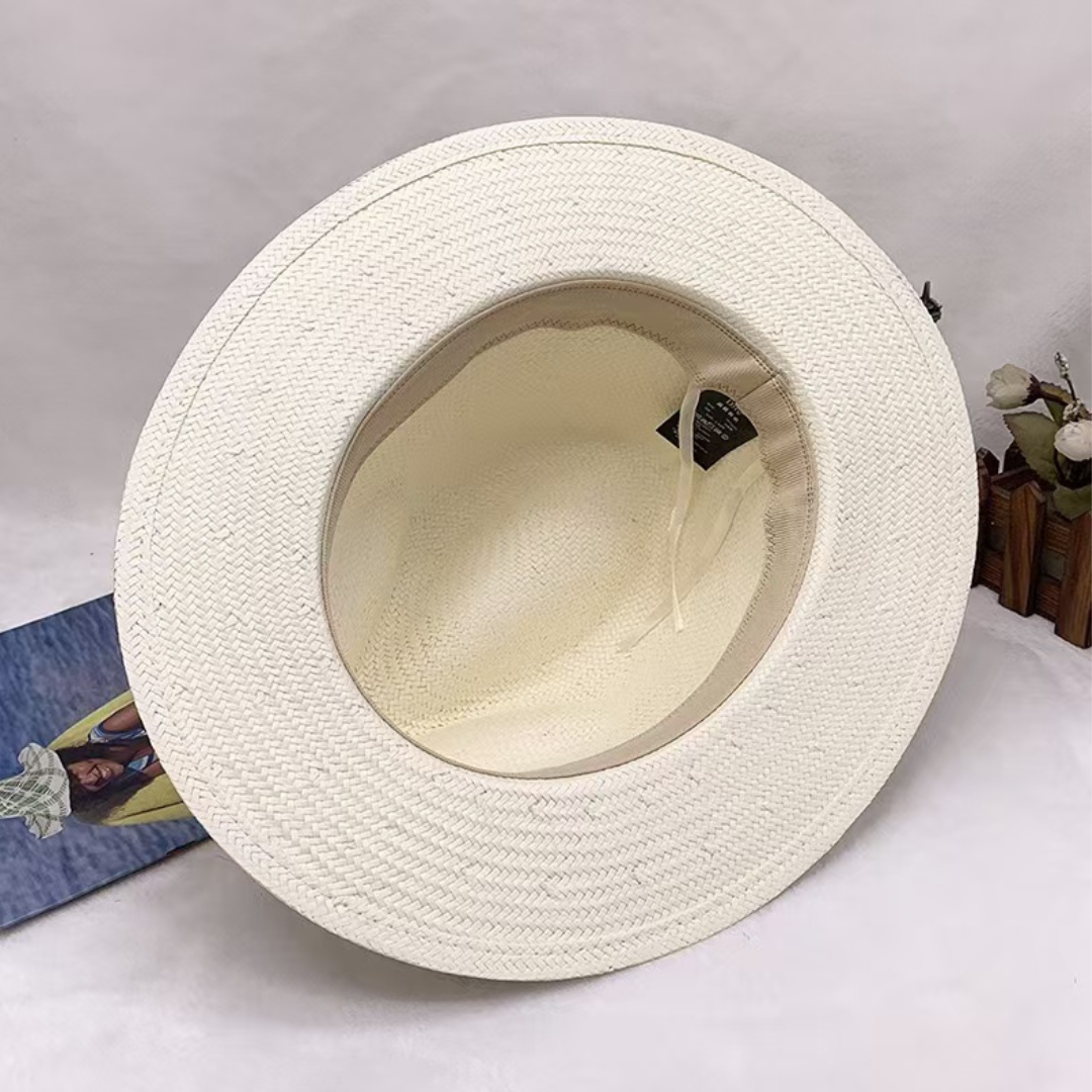 Interior view of beige fedora hat showing bamboo fiber lining and construction